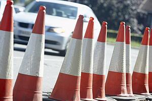Traffic Cones Lined Up On The Side Of The Road