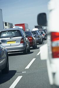 Cars Lined Up In A Traffic Jam On A Highway
