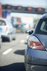 Cars Lined Up In A Traffic Jam On A Highway