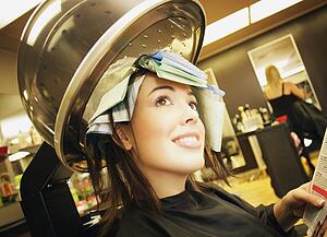 A young woman in a hair salon A young woman in a hair-salon A young woman in a hair salon
