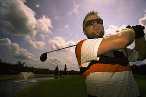 Portrait of young male golfer