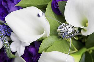 Wedding rings in flowers