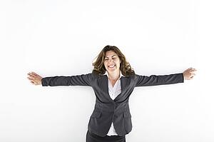 Woman with her arms raised