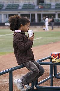 Girl at a baseball game