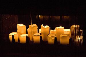 Lake of the Woods, Ontario, Canada; Candles burning brightly in dark room