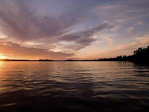 Lake of the Woods, Ontario, Canada; Twilight over still lake water