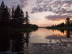 Lake of the Woods, Ontario, Canada; Sunrise over lake