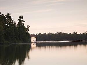 Lake of the Woods, Ontario, Canada; Early morning view to boat house