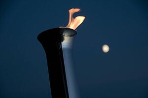 Lake of the Woods, Ontario, Canada; Torch burning brightly at night