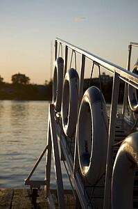 Kenora, Lake of the Woods, Ontario, Canada; Life preservers hanging on a dockside gangway