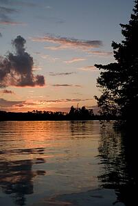 Lake of the Woods, Ontario, Canada; Majestic sunset over placid lake
