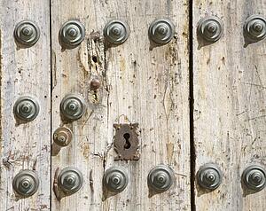 Ronda, Malaga Province, Spain; old wooden door