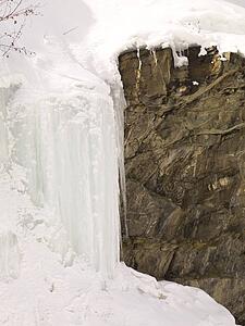 Snowy cliff, northern British Columbia, Canada