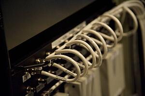 Multiple computer cables in back of console