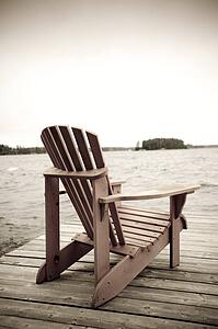 Adirondack chair on deck, Muskoka, Ontario, Canada