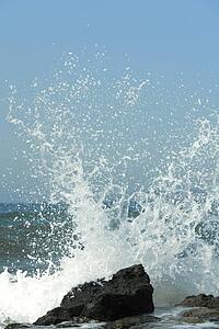 Waves breaking on rocks
