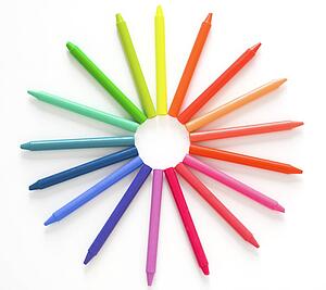 Crayons; crayons forming a circular pattern