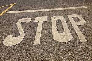 Stop painted on road 