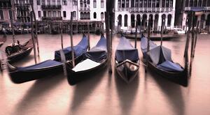 Gondolas in the Grand Canal at sunset Venice Italy