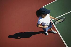 Woman plays tennis
