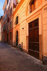 Bicycles on street in front of Buildings Rome Italy