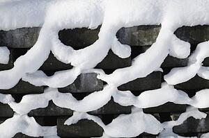 Snow on concrete bricks