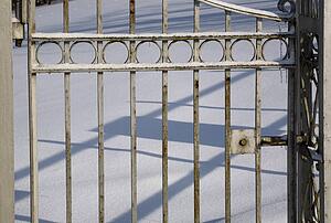Gate covered in snow