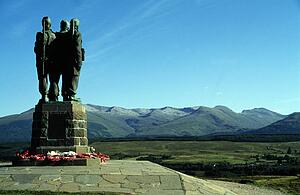 Fort William, Scotland, United Kingdom; War memorial, sculpture of soldiers looking out over the landscape