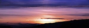 Clouds tinted by a sunset
