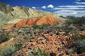 Death Valley, California, USA; Red rock formations and mountains