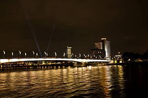 Rhine River, Germany; City lights and buildings by a river