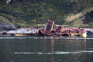 Scotland; View of rusty shipwreck 