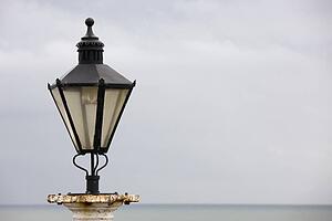 Old street light on the beachfront