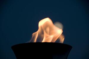 Lake of the Woods, Ontario, Canada; Torch burning brightly at night