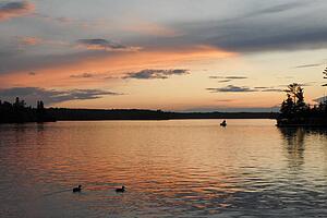 Lake of the Woods, Ontario, Canada; Majestic sunset reflected in lake