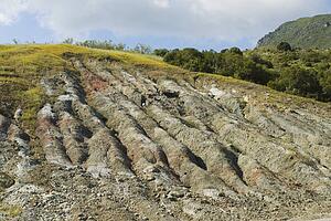 Andalucia, Spain; Craters created in landscape by heavy rainfall on mountain side