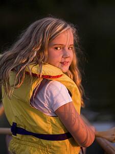 Girl in personal floatation device