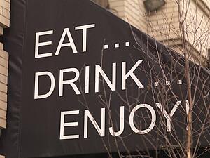 Message on restaurant canopy, Toronto, Ontario, Canada