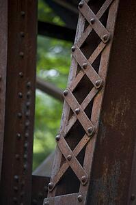 Detail of rusty bridge pylon, Bracebridge, Muskoka, Ontario, Canada