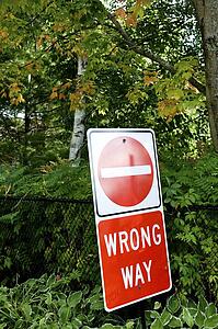 Wrong Way sign in middle of woods, Muskoka, Ontario, Canada