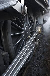 Close-up of steam engine train wheel