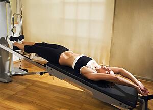 Woman on exercise machine 