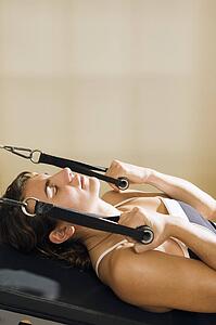 Woman on exercise machine