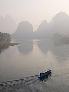 Li River, Yangshuo county, Guilin, Guangxi Province, China; Boat on the river