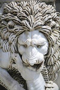 Rome, Italy; Statue of lion biting a horse