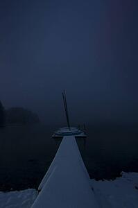 Recreation; Sailboat docked at night in winter