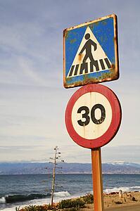 Almeria Province, Spain; road signs overlooking the sea