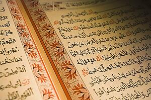 The Quran; Arabic writing in the holy book of Islam