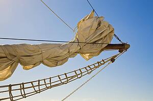 Bowsprit; front of sailing yacht shown against a blue sky