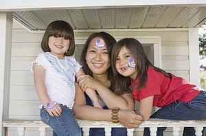 Mother with girls displaying national pride